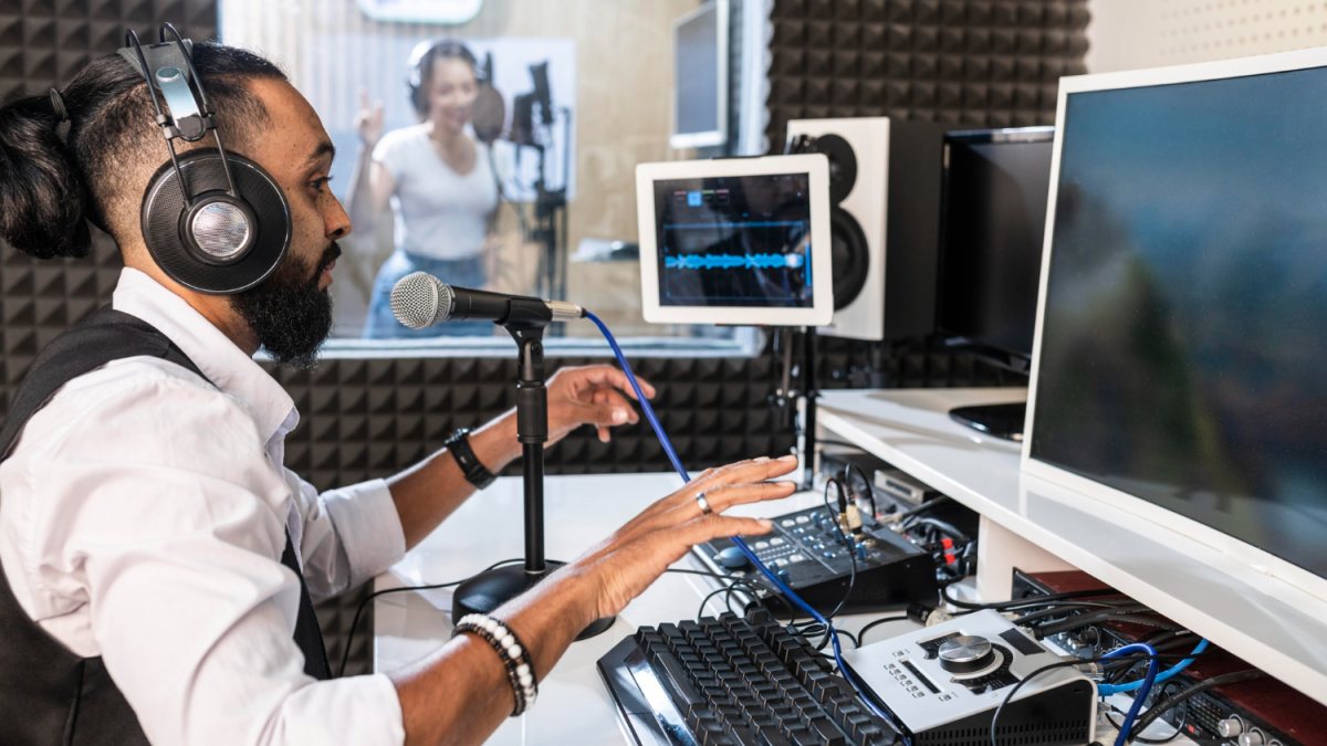 RC 101 host at the microphone in the studio